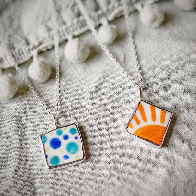 Porcelain pendants in silver mounts by Emily Jane Ceramics